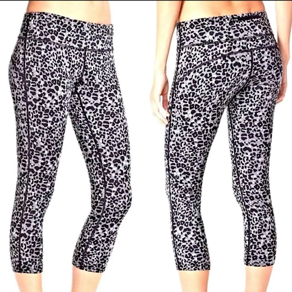 NIKE WOMENS LOTUS EPIC RUN TIGHT FIT CROP LEGGINGS